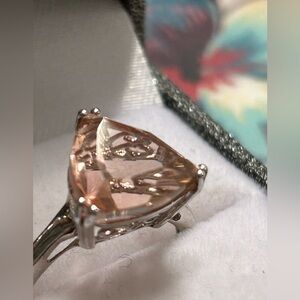 Silver ring with stone that looks like a Morganite